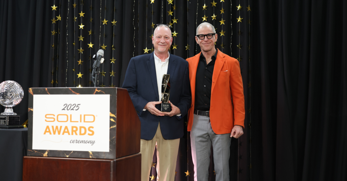 Jim Brown, Operations Manager, with Eric Wroldsen, COO, at the 2025 SOLID Awards Ceremony.